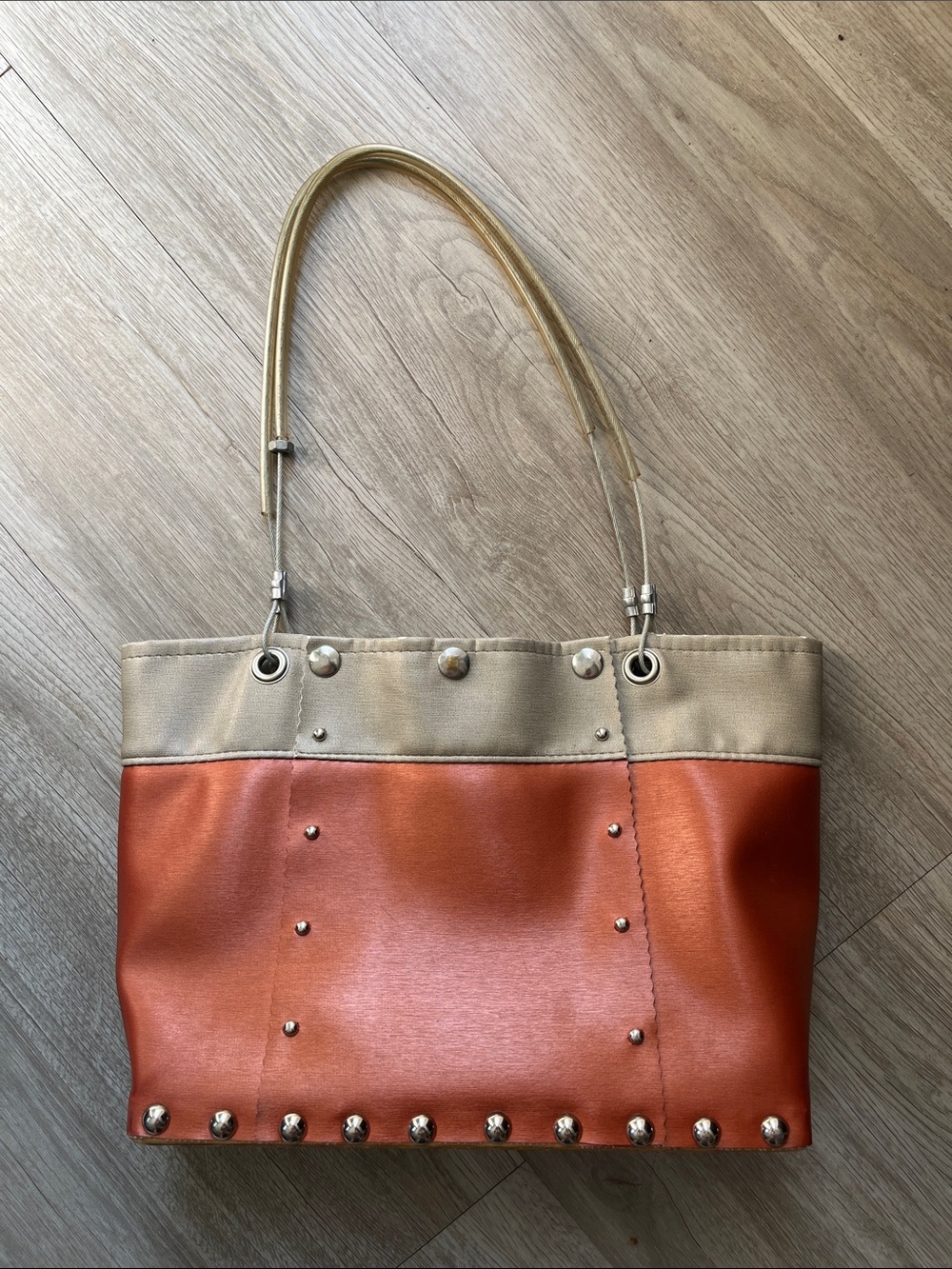 Coppery orange and metallic purse